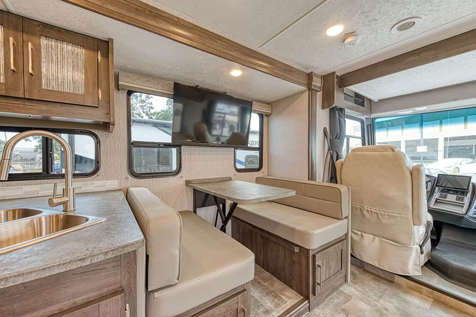 El Monte RV Class A Family Sleeper-Family_Sleeper_AF_Interior_dining_table_built